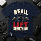 We All Lift Something T-Shirt